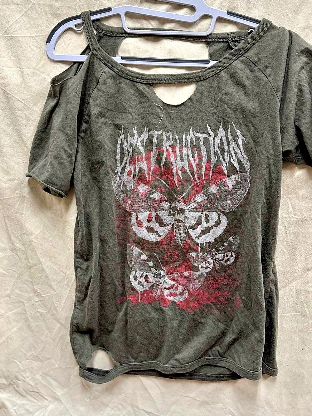 Grunge ripped green butterfly destruction shirt.